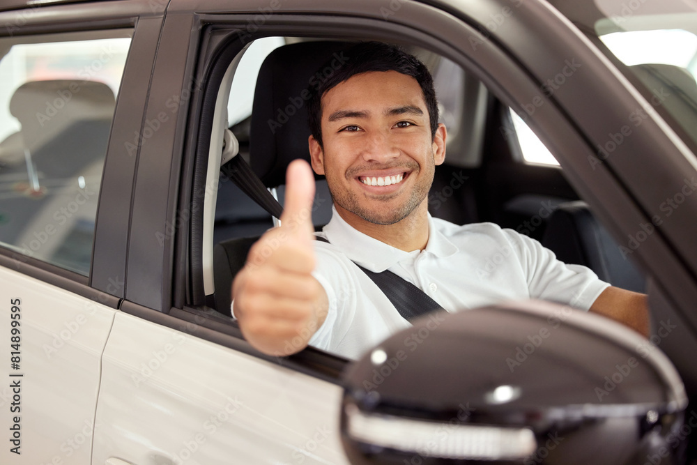 Happy, man and portrait in car with thumbs up for finance, sale or dealership agreement for insurance. Vehicle, safety and customer with choice at showroom and thank you for luxury auto transport Happy, man and portrait in car with thumbs up for finance, sale or dealership agreement for insurance. Vehicle, safety and customer with choice at showroom and thank you for luxury auto transport
