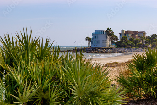 Stately homes sit along the shoreline of the Alantic Ocean near Charleston, South Carolina, USA photo