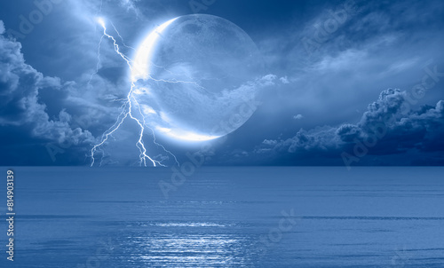 Abstract dark blue background with crescent in the sea with lightning at night © muratart