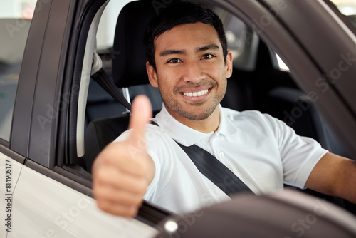Happy, portrait and man in car with thumbs up for finance, sale or dealership agreement for insurance. Vehicle, safety and customer with choice at showroom and driver thank you for luxury transport © peopleimages.com