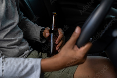 That s a dangerous thing to do. Drinking beer while driving is both illegal and unsafe.