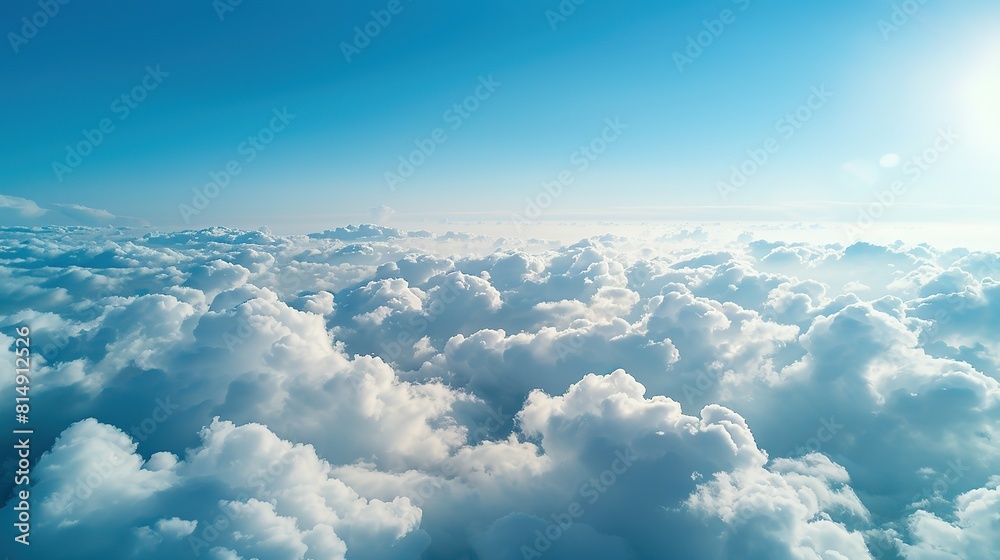 Aerial view White clouds in blue sky, high above the Earth's surface, creating a picturesque scene Aerial view White clouds in blue sky, high above the Earth's surface, creating a picturesque scene
