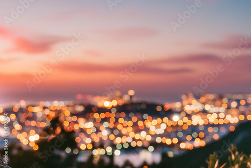 The lights of the night city. Blurred background. Lanterns on the street. big city lights in the twilight evening with blurring. Colorful circles of light abstract. circular bokeh on blue horizon. © ATRPhoto
