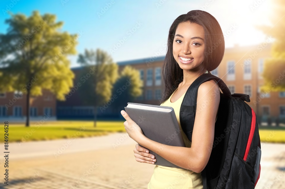 Obraz premium Portrait of lady student posing outdoors