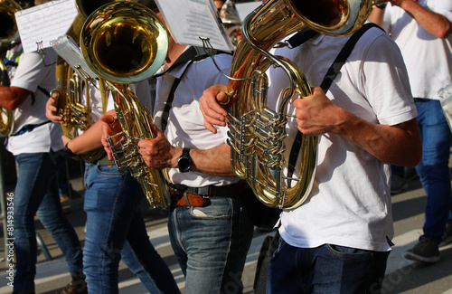 french horn players in a marching band performing photo