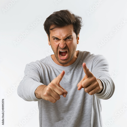 an aggressive and angry man shouting, fingers pointing