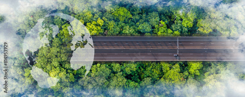 Forest road with Layout of earth planet  on through forest. Save Earth. Concept of the Environment World Earth Day. Car with nature