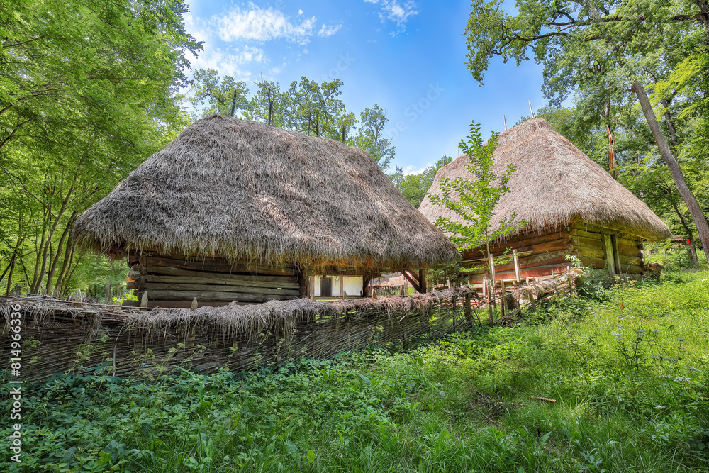 Gorgeous summer scene of traditional romanian peasant houses. Gorgeous summer scene of traditional romanian peasant houses.