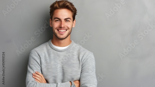 A Confident Man in Gray Sweater photo