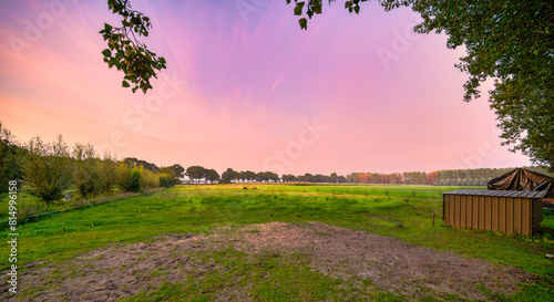 Dusk sets in over the rural landscape near the village of Aarle-Rixtel, The Netherlands. photo