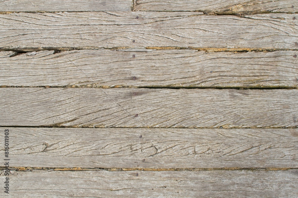 texture of old weathered wooden sea break