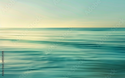 Blurred seascape with soft  sweeping lines in tranquil blue-green hues.