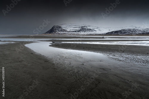 Snowy mountain shore