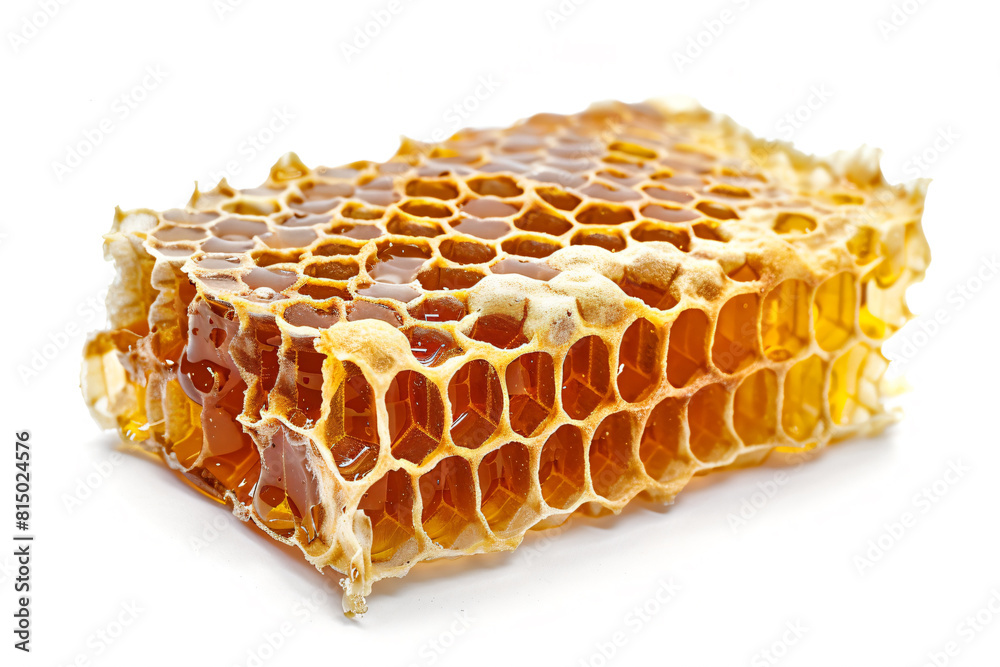 a piece of honeycomb with honey on it a piece of honeycomb with honey on it