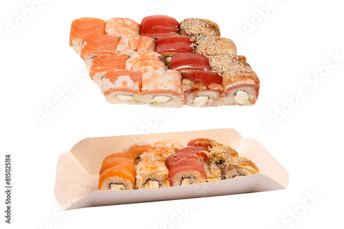 Food delivery. A box with sushi rolls in woman hands isolated.