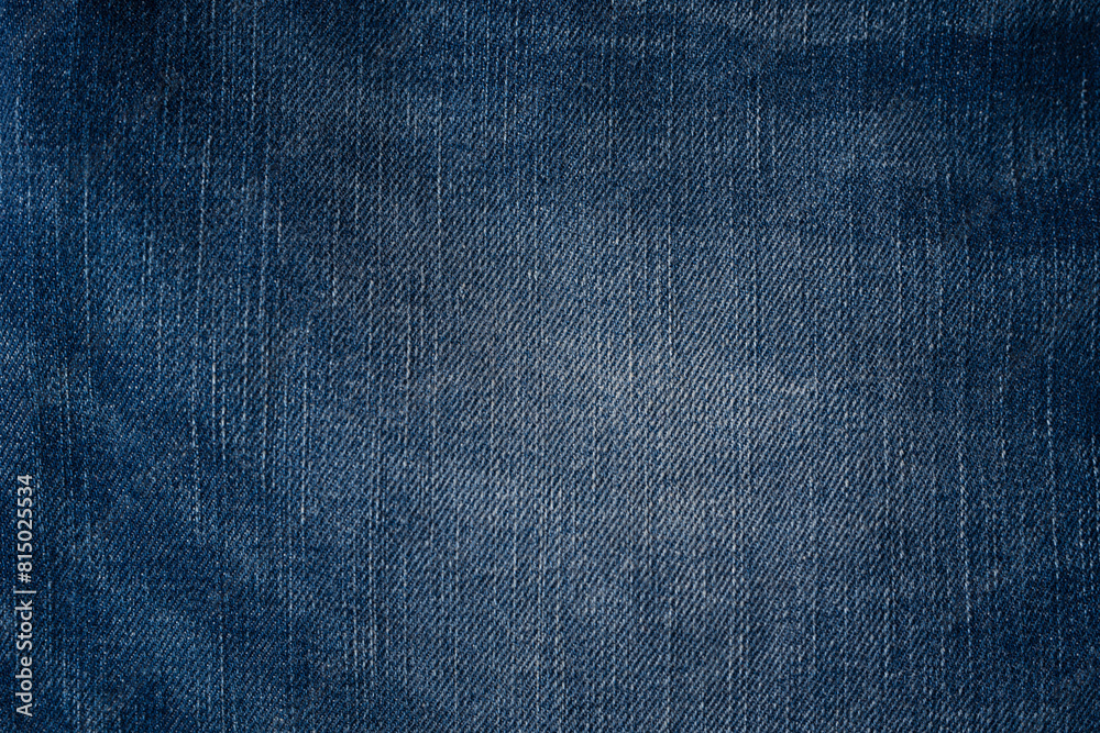 Blue jeans denim texture as a background. Top view.