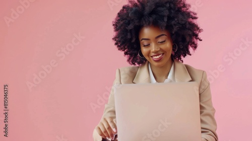 Woman Engaged with Her Laptop photo