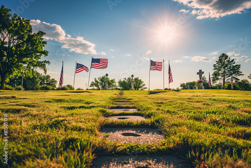 Artistic perspective of small footprints leading to a Memorial Day ceremony with American flags. photo