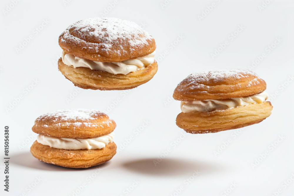 a group of three pastries with icing on them