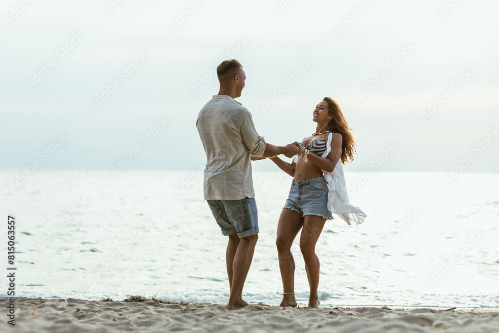 Man and Woman Dancing on the Beach Man and Woman Dancing on the Beach
