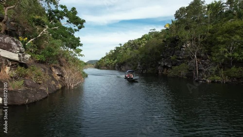 aerial view of boat sailing on Serra da Mesa Lake in Colinas do Sul, Chapada dos Veadeiros, Brazil, photo