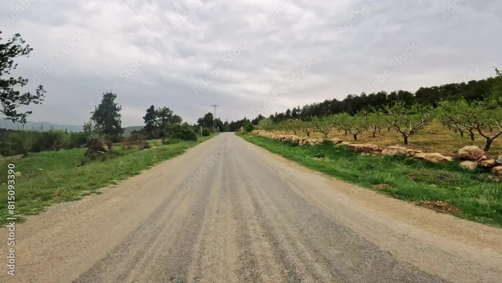 First-person video on mountain road through narrow pass. Footage captures driving along narrow pass. Drive showcases scenic narrow pass in mountainous terrain First-person video on mountain road through narrow pass. Footage captures driving along narrow pass. Drive showcases scenic narrow pass in mountainous terrain