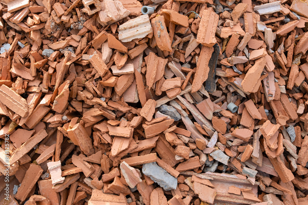 Shattered, broken Red clay Ceramic Bricks, construction waste after building demolition. collection service Shattered, broken Red clay Ceramic Bricks, construction waste after building demolition. collection service