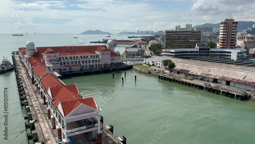 George Town panorama view of the cruise terminal pier, skyline and Jambatan Pulau Pinang bridge as seen from a ship, Penang, Malaysia photo
