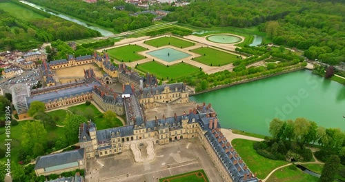 Aerial view on the castle of fontainebleau and his garden. Drone view of medieval landmark royal castle Fontainebleau, France. The Castle of Fontainebleau photo