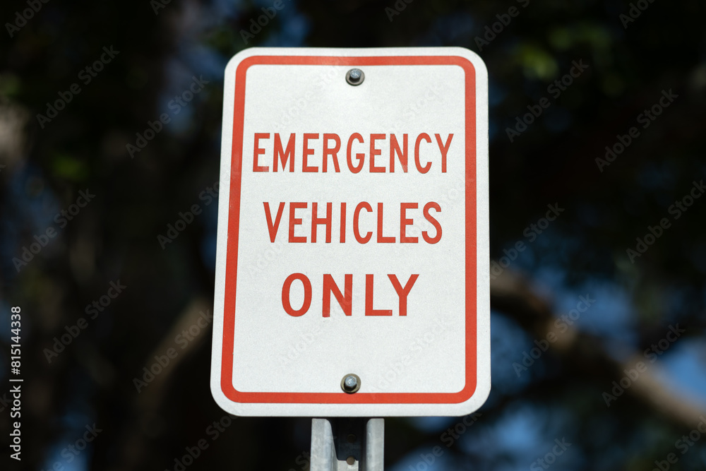 Rustic emergency vehicles only sign a little beaten up Rustic emergency vehicles only sign a little beaten up