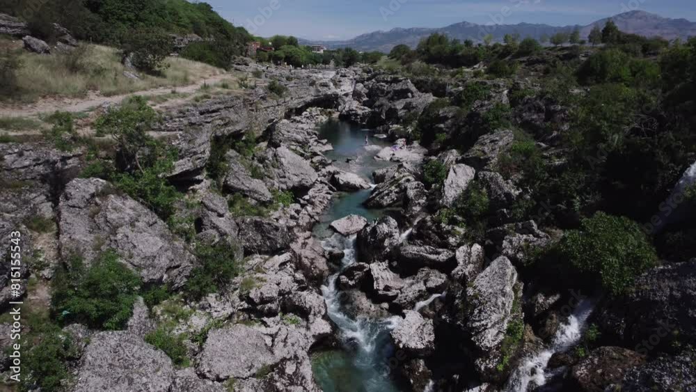 Aerial video of the Chibna River flowing swiftly through rock outcrops in Montenegro Aerial video of the Chibna River flowing swiftly through rock outcrops in Montenegro
