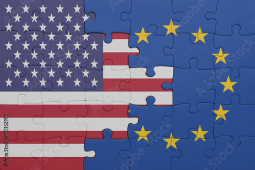 puzzle with the colourful national flag of european union and flag of united states of america . © luzitanija