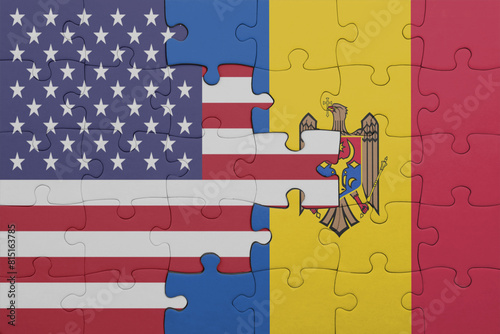 puzzle with the colourful national flag of moldova and flag of united states of america .