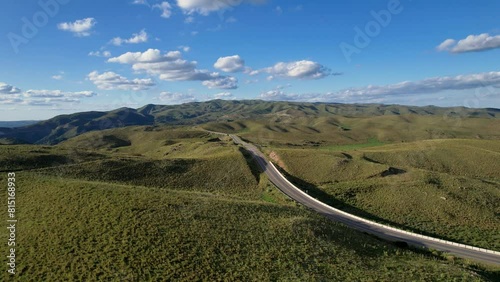 Ruta, autopista, camino entre montañas. Vista panoramica de dron. Córdoba, Argentina, Camino del Cuadrado.  photo