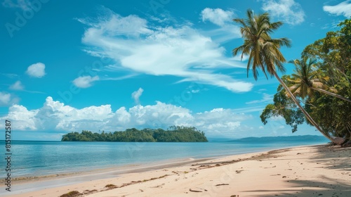 Palm trees line a sandy beach  under a clear blue sky. The waves gently kiss the shore  creating a serene atmosphere