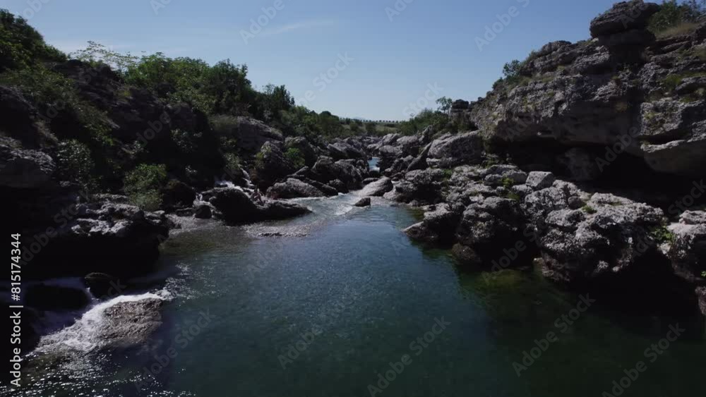 Aerial video of the Chibna River flowing swiftly through rock outcrops in Montenegro Aerial video of the Chibna River flowing swiftly through rock outcrops in Montenegro