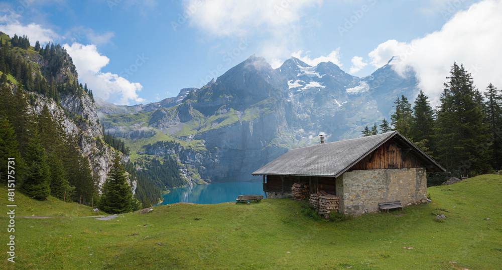 pictorial landscape above lake Oeschinensee, with hut and mountain view pictorial landscape above lake Oeschinensee, with hut and mountain view