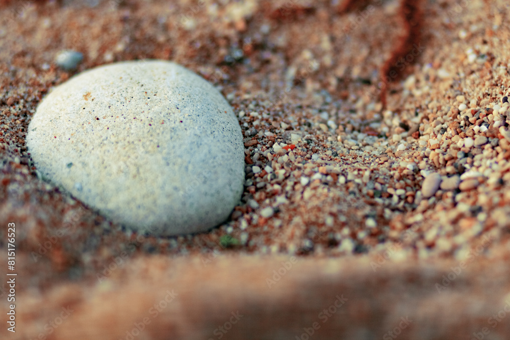 Wet pebbles and sand on the seashore. Bokeh. Black sea, Crimea. Wet pebbles and sand on the seashore. Bokeh. Black sea, Crimea.