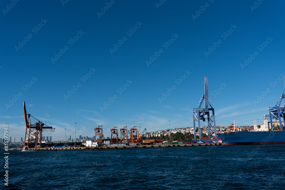 Fototapeta premium commercial shipping port. commercial ships loading and unloading in the port