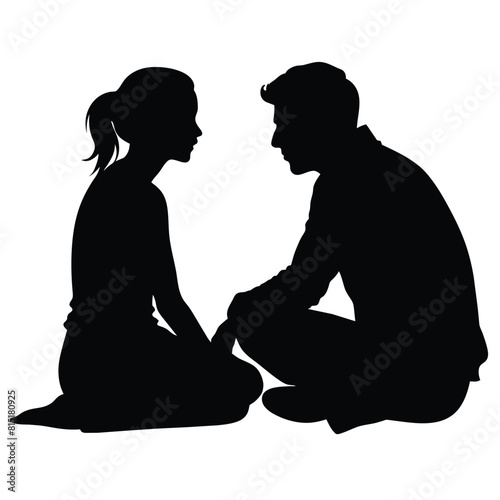 A girlfriend and boyfriend talking to each other while sitting on the ground