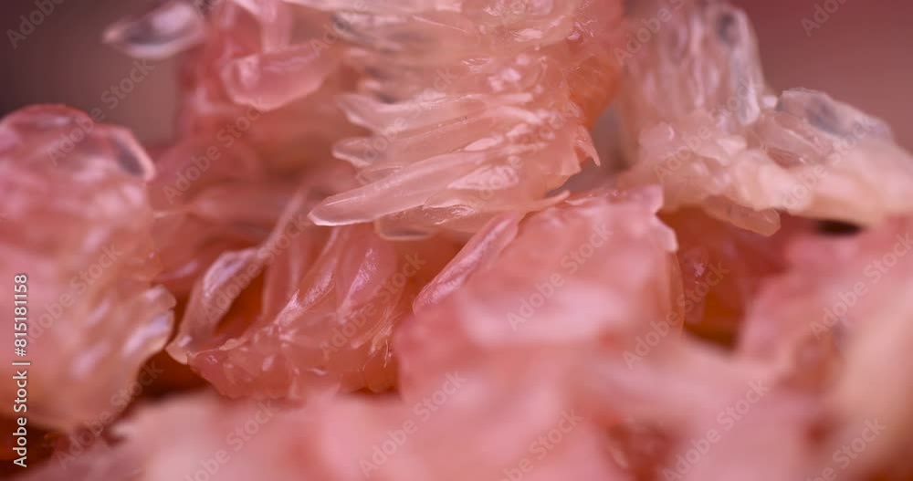 peeled red and pink pomelo on the table, citrus pomelo peeled and folded on the table peeled red and pink pomelo on the table, citrus pomelo peeled and folded on the table