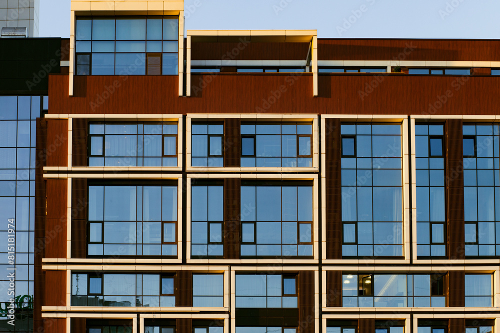 Close-up of the facade of a modern residential building, windows, balconies. Close-up of the facade of a modern residential building, windows, balconies.