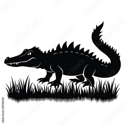 Vector silhouette of a crocodile icon blending into the grass © Chayon Sarker