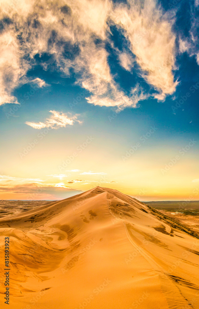 colorful sunset over the dunes of the gobi desert colorful sunset over the dunes of the gobi desert