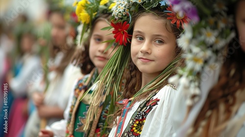 Women and young girls adorned in traditional attire from the Lowicz region in Poland participate in the yearly Corpus Christi procession photo
