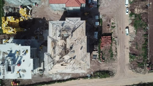 Aerial view of the roof of the building on the construction site
