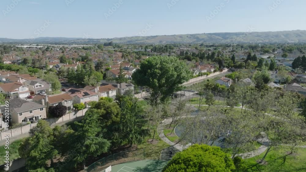 Sweeping reveal Drone shot of park and suburb neighborhood in Northern California - 4K Sweeping reveal Drone shot of park and suburb neighborhood in Northern California - 4K