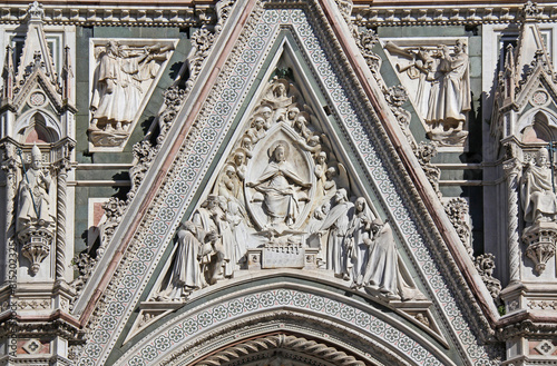 Maria in gloria; bassorilievo sopra il portale maggiore del Duomo di Santa Maria del Fiore a Firenze photo