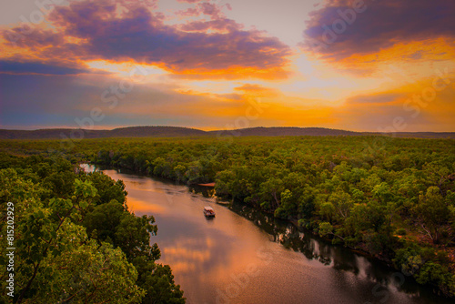 Sunset above the rive and forest