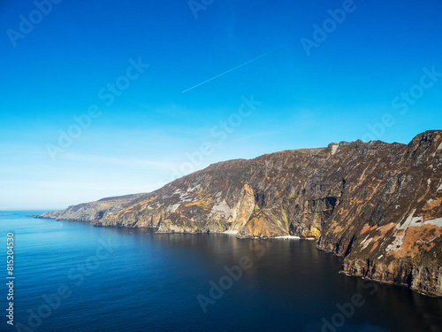 View on amazing Slieve league Cliff, county Donegal, Ireland. Popular travel landmark area with stunning nature view and hiking route. Nobody. Warm sunny day. Travel and tourism.  photo